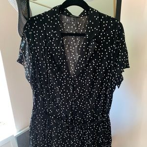 Black polka dots belted romper